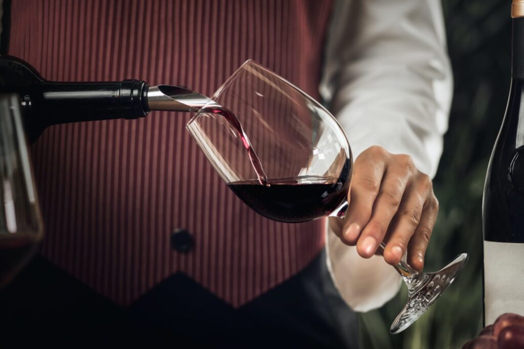 A GLASS OF WINE